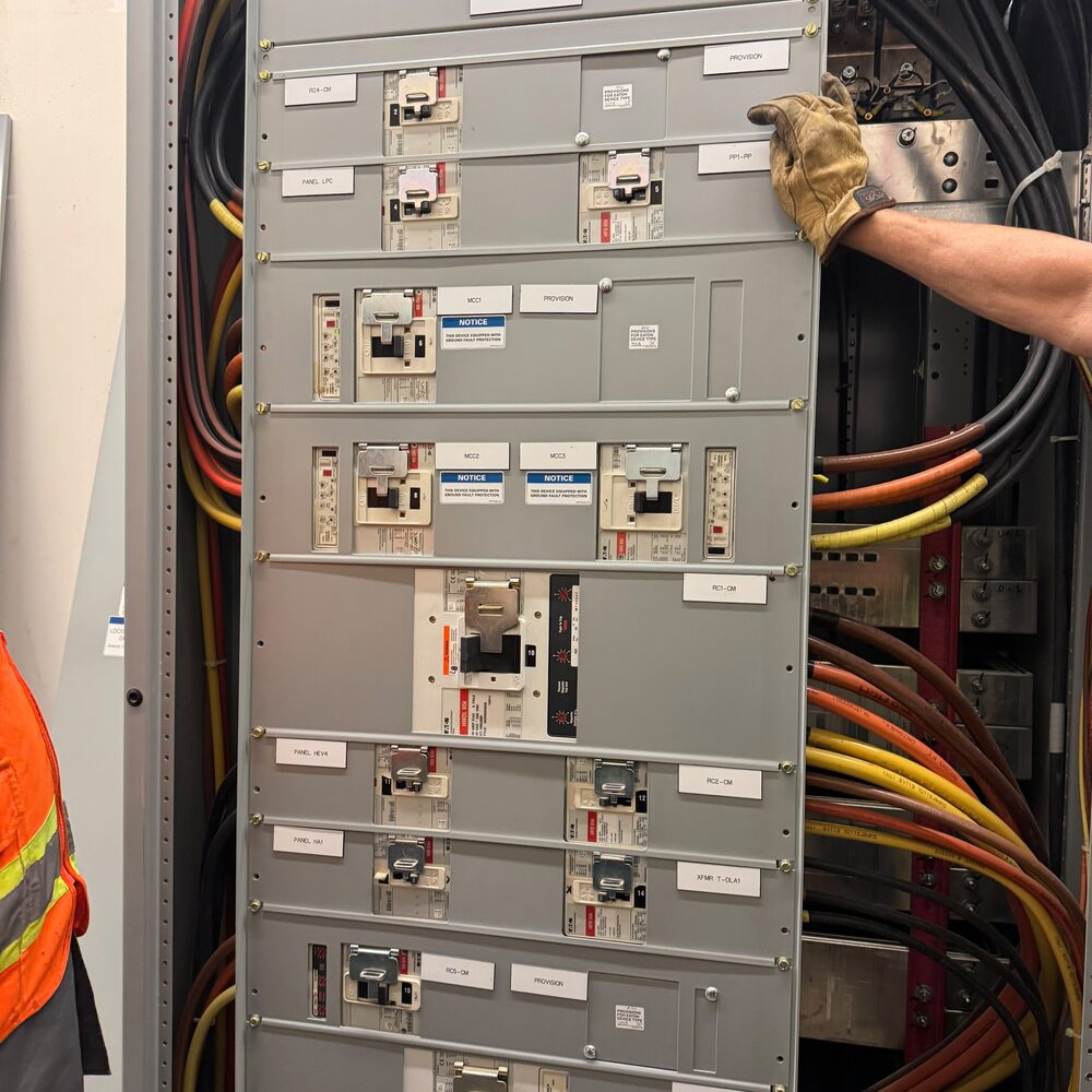 Main switchboard installation with feeder breakers and field cabling